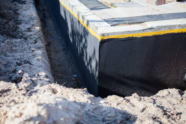Professional Waterproofing technician working in Harrison, OH